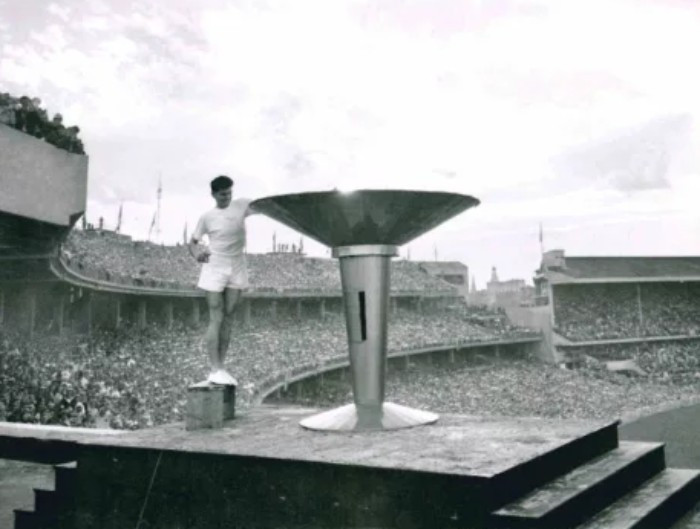 Ron Clarke pictured lighting the Olympic Flame at the Melbourne 1956 Opening Ceremony ©AOC