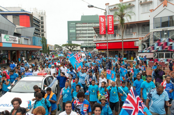 Fijians escort their Rio 2016 rugby sevens team through the streets of Suva following a victory that was a landmark both for their country and the sport ©Getty Images