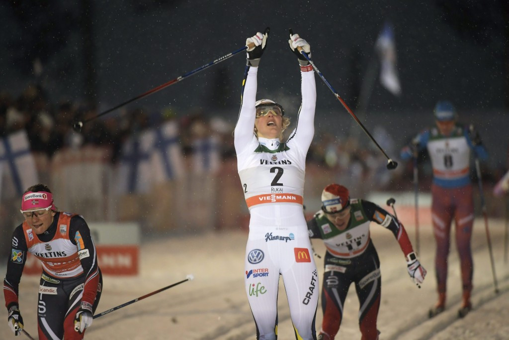 Stina Nilsson celebrates her win in the women's race ©Getty Images