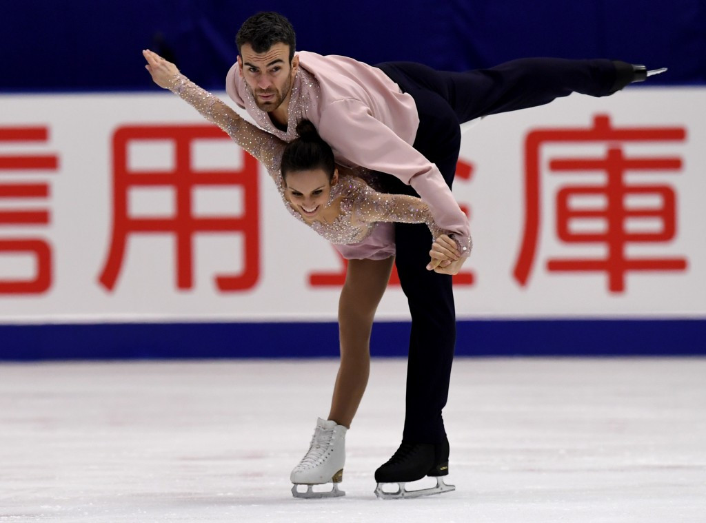 Canadian duo Meagan Duhamel and Eric Radford, the two-time world champions who were second after yesterday’s free programme, snatched gold in the pairs event ©Getty Images