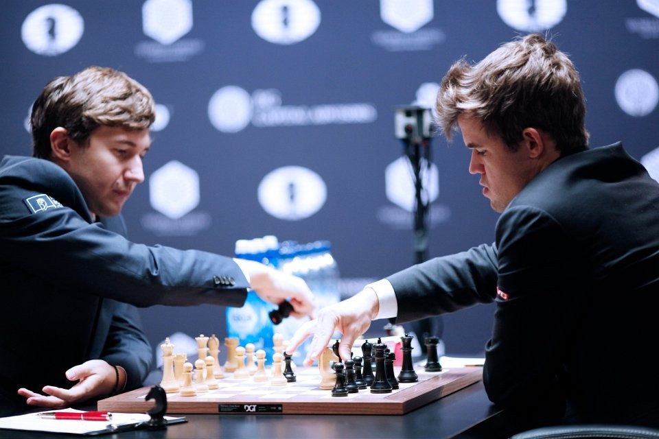 The World Chess Championship between Magnus Carlsen (right) and Sergey Karjakin remains level with one game to play ©FIDE