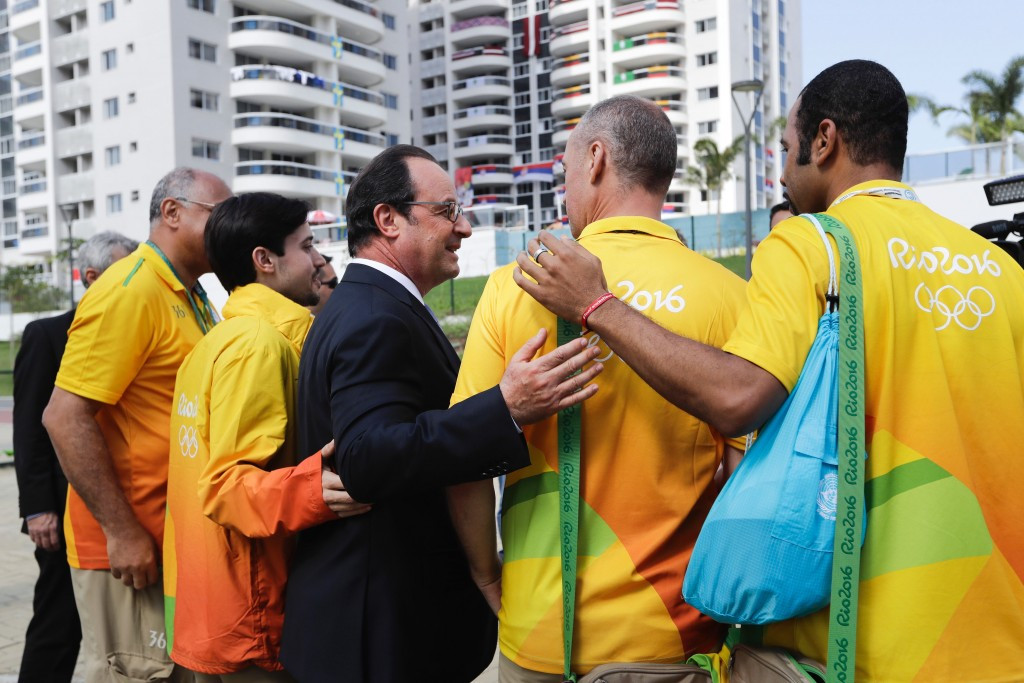 François Hollande pictured with volunteers while attending the Rio 2016 Olympic Games in August ©Getty Images