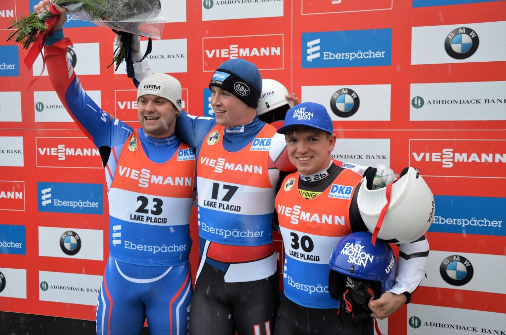Tucker West (centre) recovered from disappointment to claim World Cup victory ©FIL