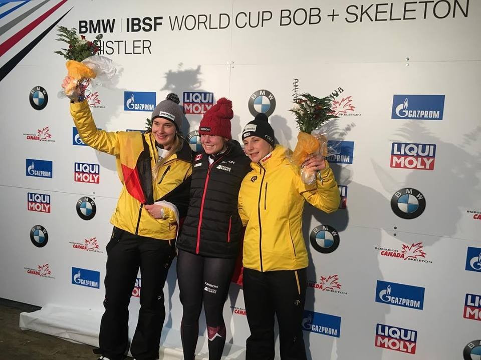 Canada's Elisabeth Vathje celebrates her victory alongside the Germany's  Jacqueline Lölling and Tina Herman ©IBSF/Facebook