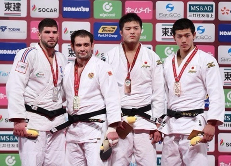 Kurill Denisov, left, claimed the gold medal in the men's under 100kg gold ©IJF