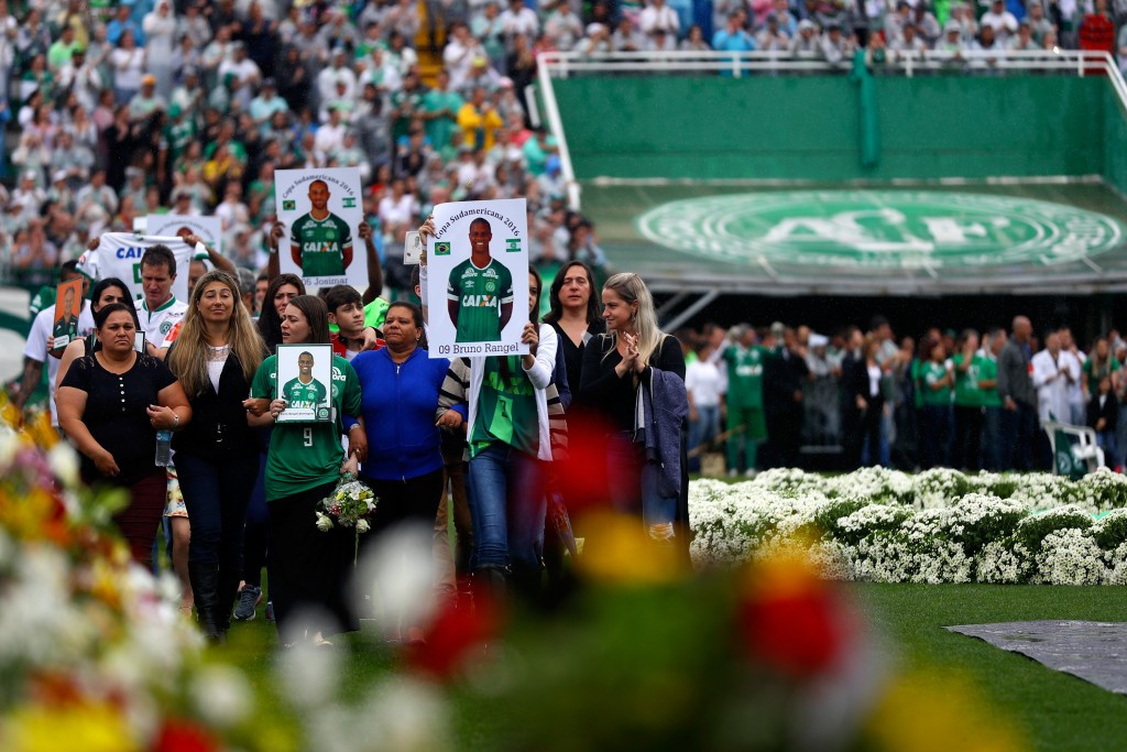 Chapecoense fans pay tribute to the people who died in the air crash at a service held at the team's home ground, the Arena Conda ©Getty Images