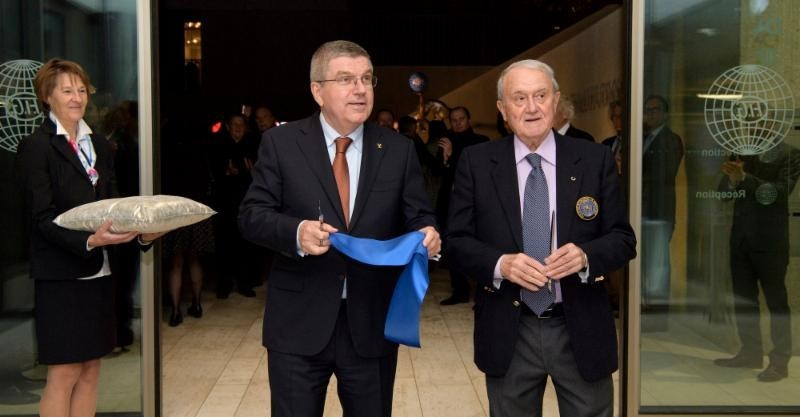 IOC President Thomas Bach (left) and outgoing FIG head Bruno Grandi at the opening of the headquarters ©FIG