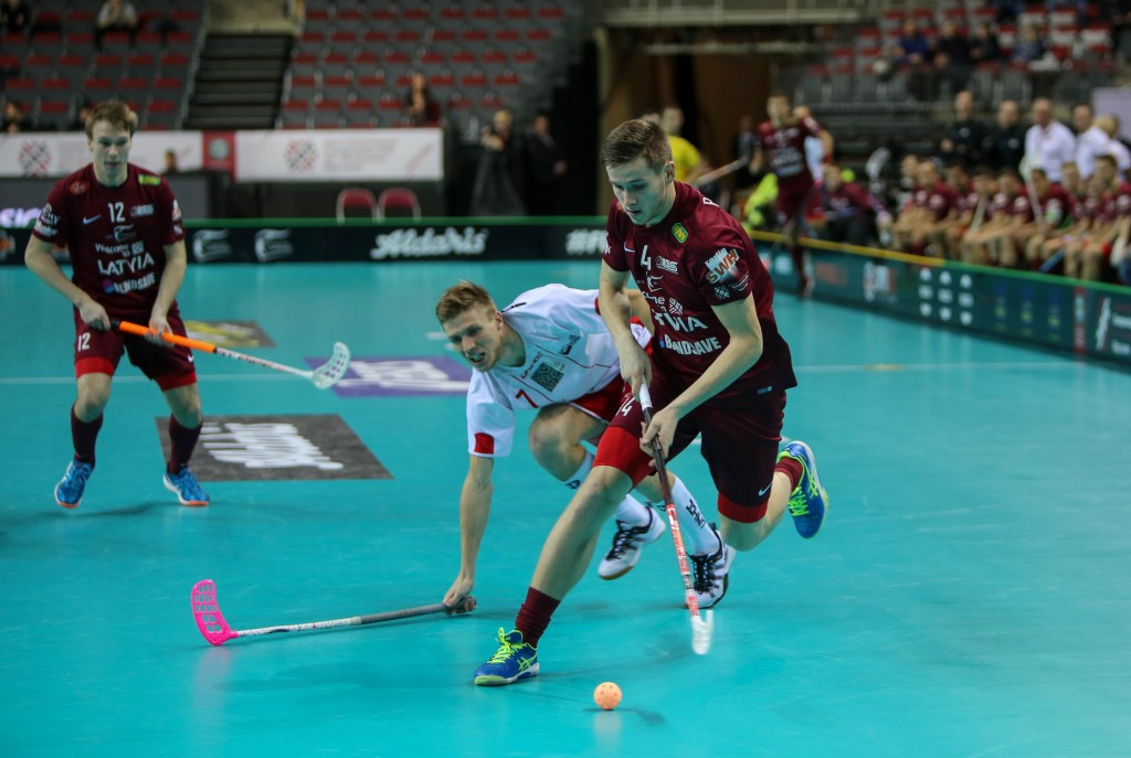 Hosts Latvia (black) missed out on a place in the quarter-finals following defeat to Denmark ©Flickr
