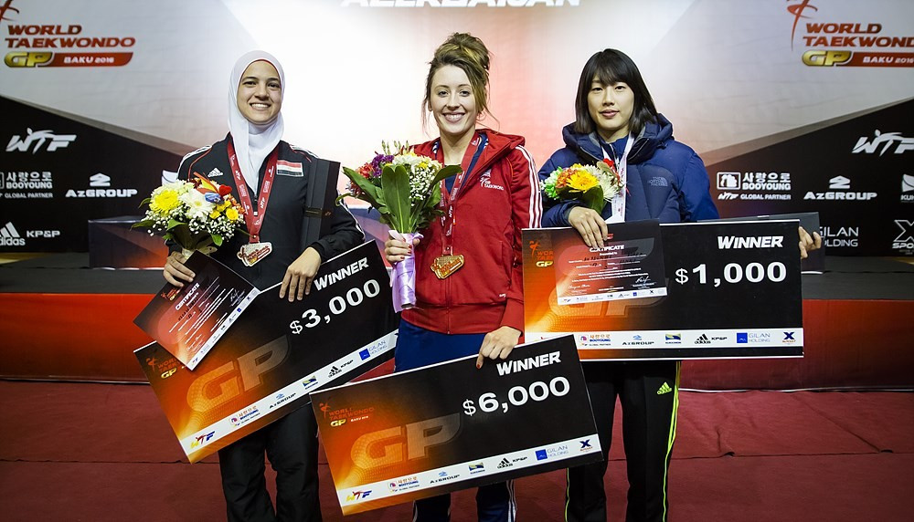 Jade Jones (centre) also won gold today for Great Britain, triumphing in the women's under 57kg category ©WTF