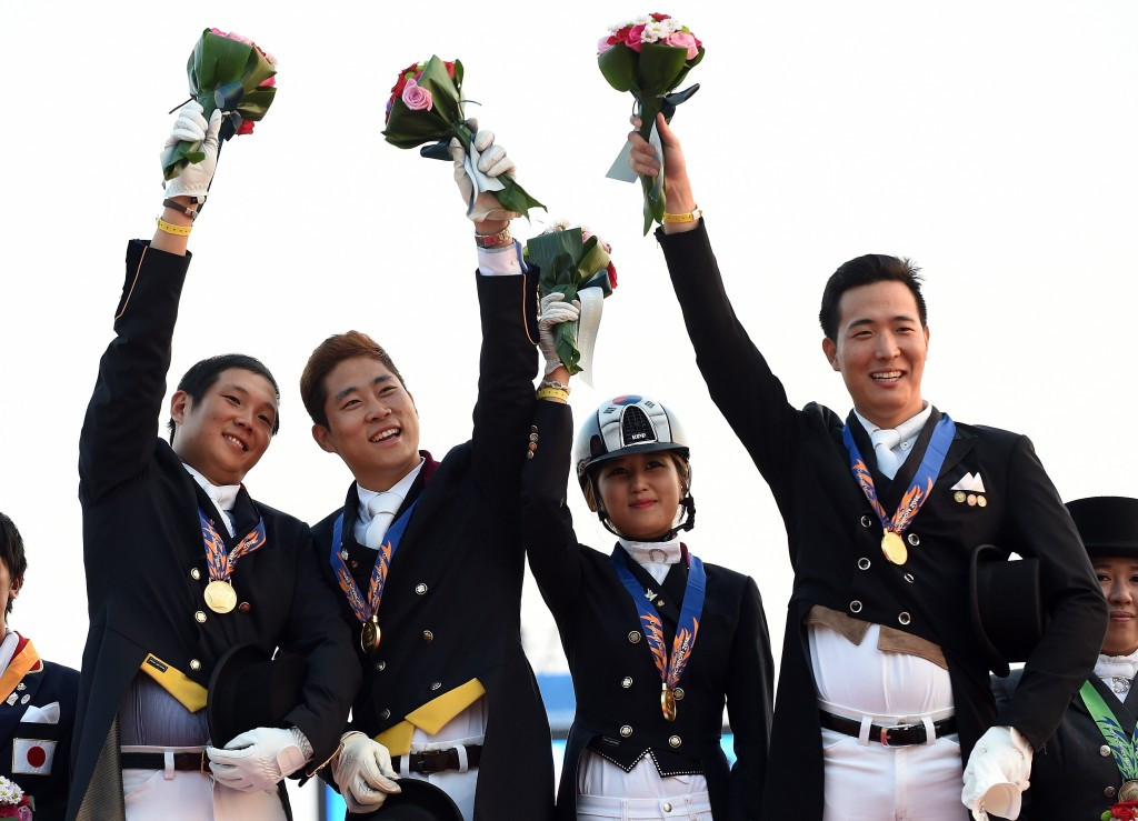 Chung Yoo-ra (second right) is at the centre of the Korea Equestrian Federation probe ©Getty Images