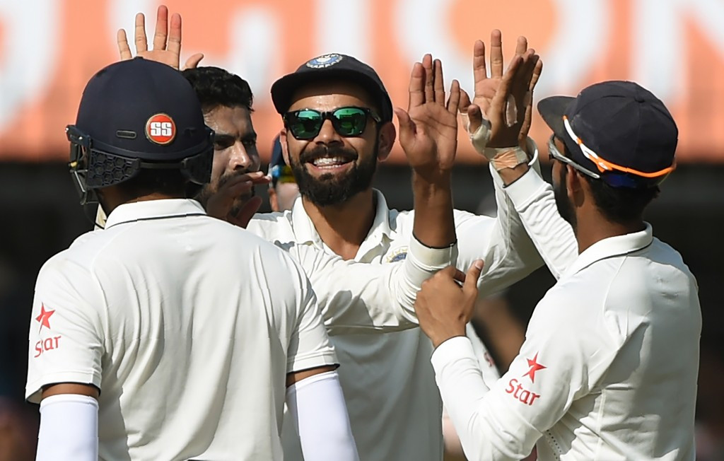 Virat Kohil (centre) celebrates a wicket with his Indian team-mates. He currently averages more than 50 in all three three formats of international cricket ©Getty Images