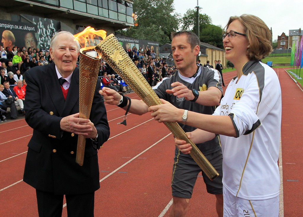 Sir Roger Bannister carried the Olympic flame during the London 2012 Torch Relay ©Getty Images