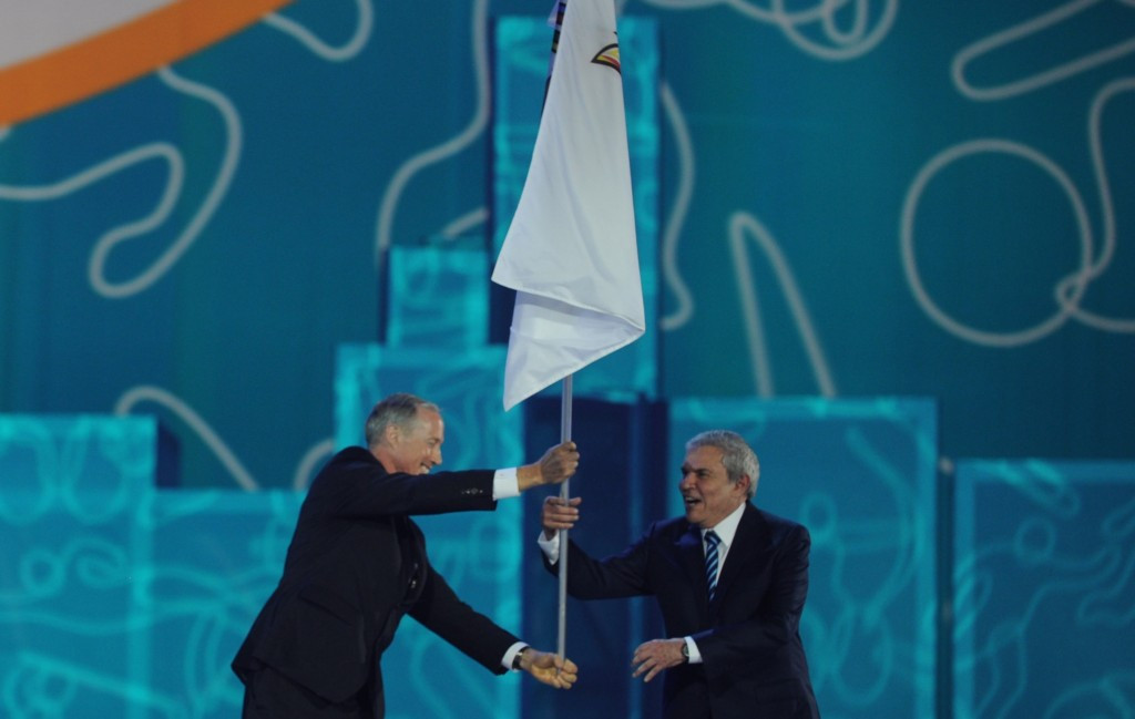 Lima Mayor Luis Castañeda Lossio (right) pictured receiving the PASO flag during the Closing Ceremony of the Toronto 2015 Games ©Getty Images 