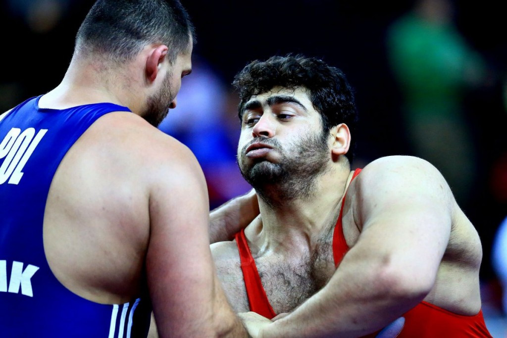 Bashir Asgari Babajanzadeh, right, is one of two athletes to be banned for four years ©UWW