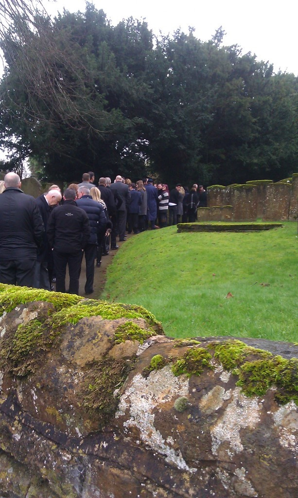 A queue waiting to get in to John Buckingham's memorial service in Chipping Warden ©ITG