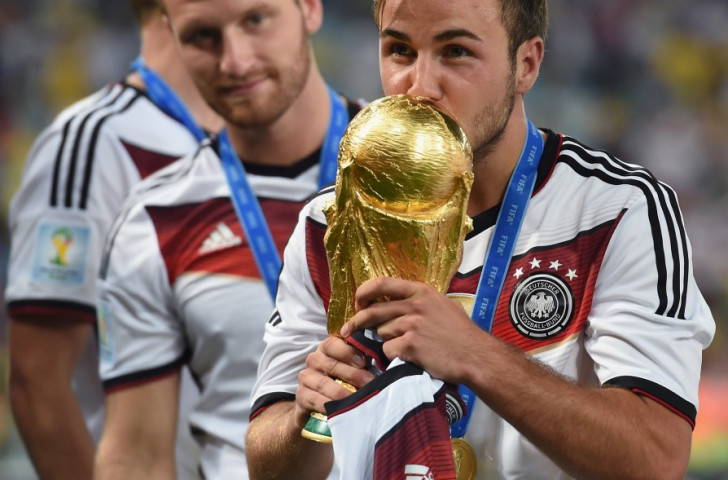 Mario Goetze kisses the World Cup trophy his goal against Argentina won for Germany in the 2014 final. Germany's frequent success in the tournament is preventing other teams from winning ©Getty Images