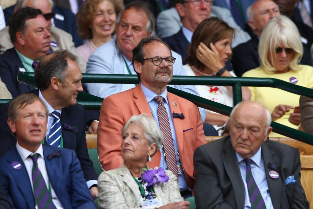 Michael Downey, wearing the orange jacket, at the 2016 Wimbledon Championships. He has announced he will be stepping down as the Lawn Tennis Association chief executive ©Getty Images