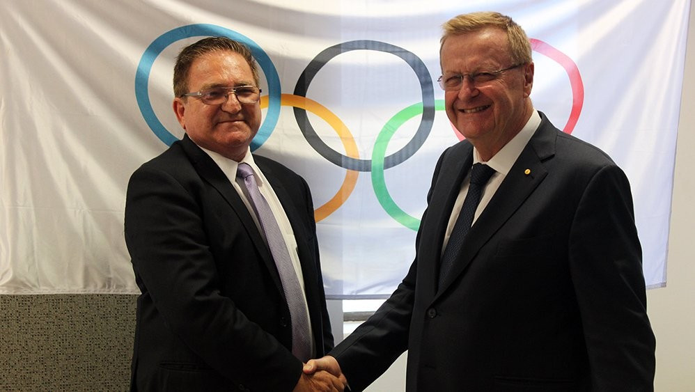 AKF President Michael Kassis has held a meeting with IOC vice president and AOC President John Coates ©WKF