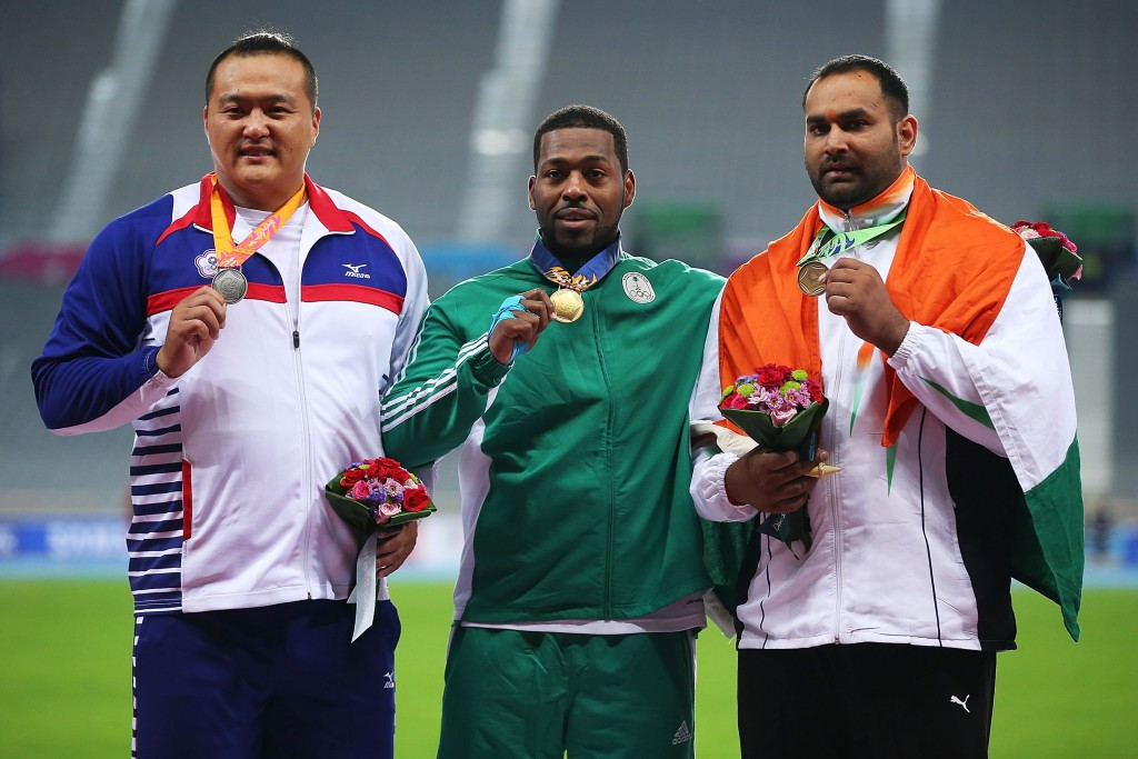 Inderjeet Singh, right, won shot put bronze at the 2014 Asian Games in Incheon ©Getty Images