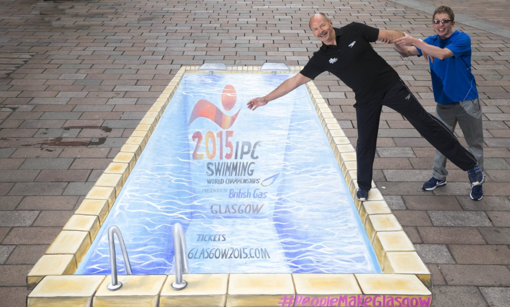Montreal 1976 Olympic gold medallist David Wilkie was joined by Scot Quin, a member of Britain's team for the IPC Swimming World Championships in Glasgow, to unveil the special piece of street art 