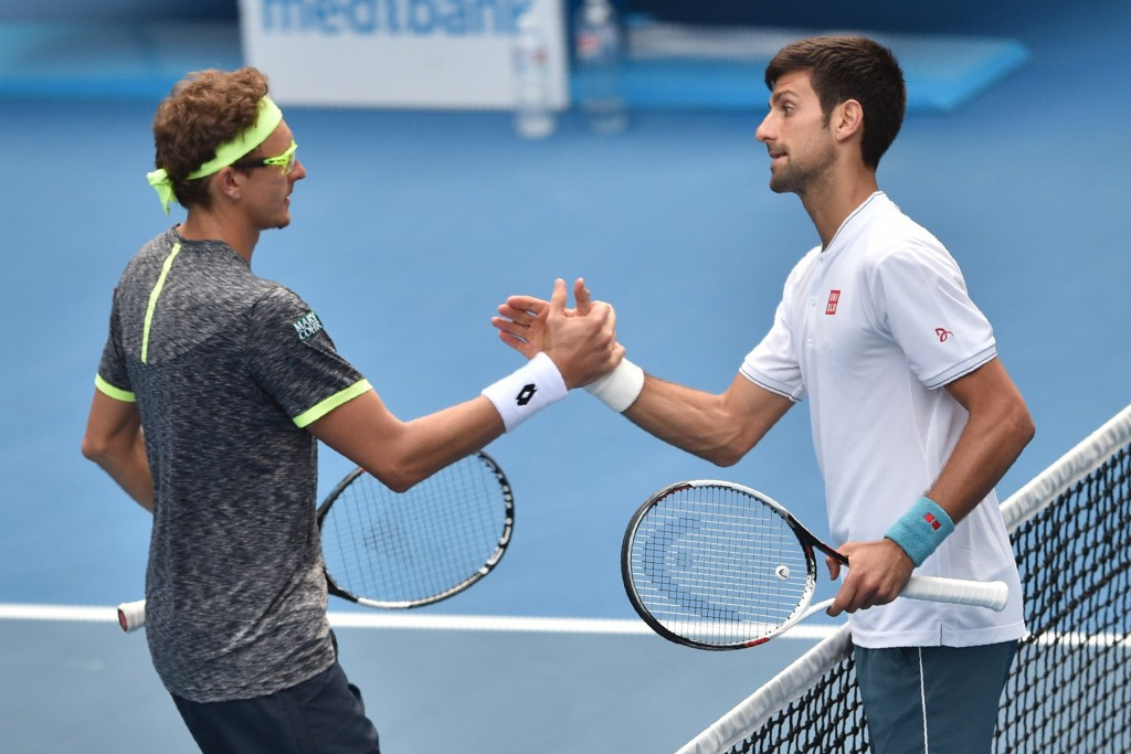 Novak Djokovic congratulates Denis Istomin after the match ©Getty Images