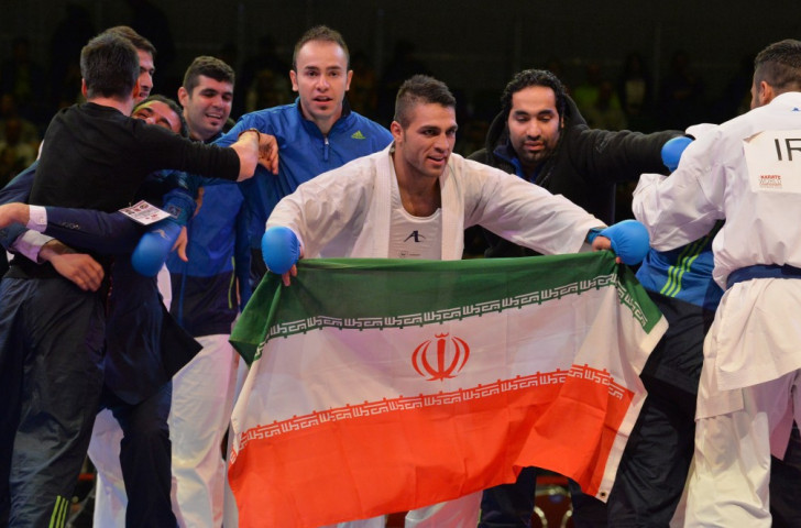 Iran celebrate victory in the team kumite competition at the 2014 World Championships in Bremen. The following edition, in Linz, drew record numbers of entrants ©Getty Images