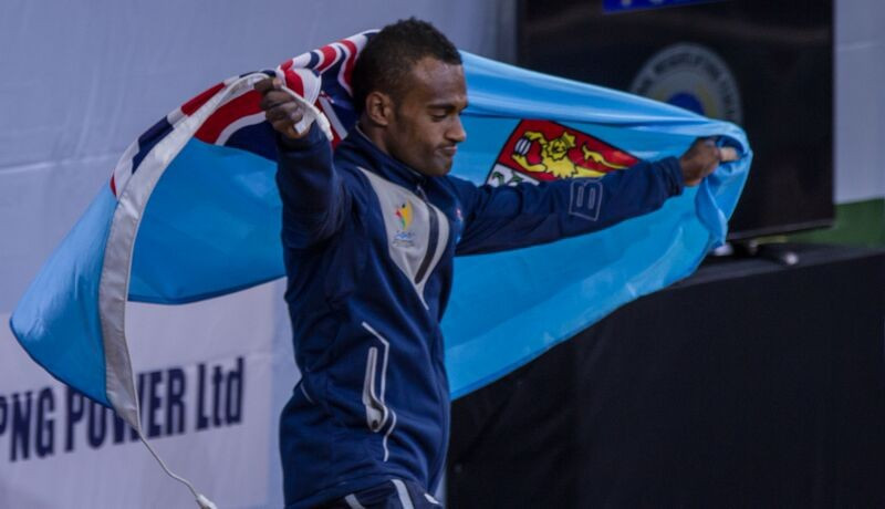 Manueli Tulo of Fiji was in dominant form as he won all three men's 56kg medals on the opening day of weightlifting action ©Port Moresby 2015
