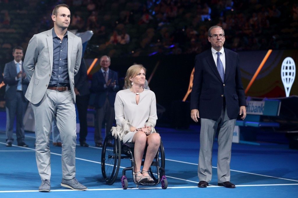 Andy Roddick, Monique Kalkman-van den Bosch and Steve Flink, left to right, being added during the Australian Open ©Getty Images