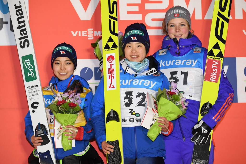 Sara Takanashi, left, has watched Japanese team-mate Yuki Ito, centre, and Norway's Maren Lundby, right, beat her in the last two stages ©Getty Images