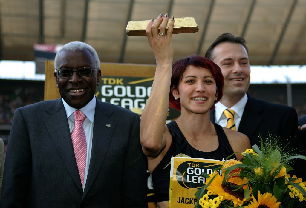 Russia's Tatyana Lebedeva, right, pictured with former International Association of Athletics Federations President Lamine Diack in 2005 ©Getty Images