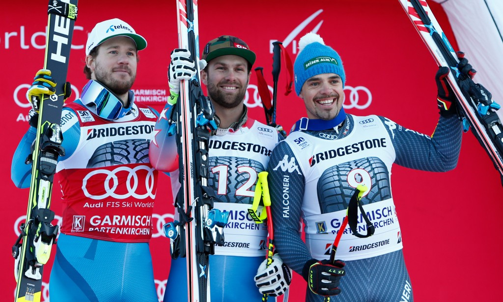 Travis Ganong, centre, of the United States won the downhill race in Garmisch-Partenkirchen. Norway's Kjetil Jansrud, left, was second and Italy's Peter Fill, right, came third ©Getty Images