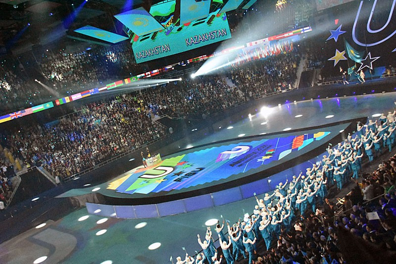 The traditional Parade of Nations saw athletes complete a lap of the Almaty Arena ©FISU