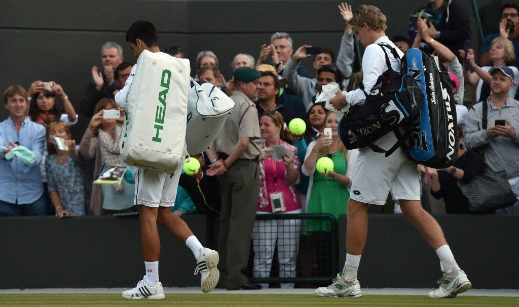 Djokovic fightback halted by bad light as Wimbledon enters second week