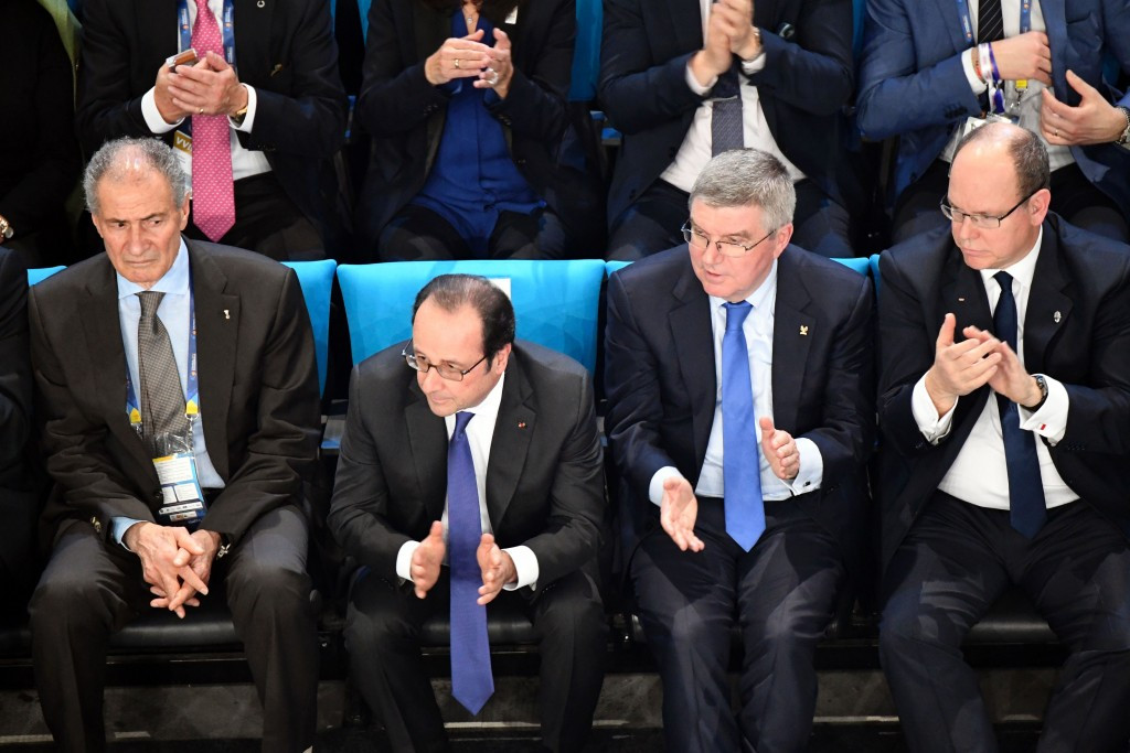 IOC President Thomas Bach, second right, watches the IHF Men's World Championship Final in Paris with French President Francois Hollande, second left, and Prince Albert II of Monaco, right ©Getty Images
