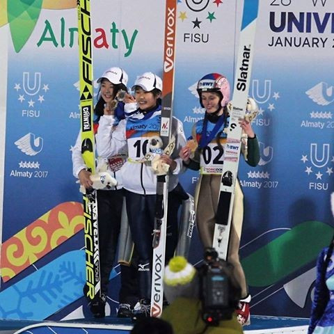 Japan's Haruka Iwasa, centre, won gold in the women’s normal hill individual ski jumping competition ©Almaty 2017