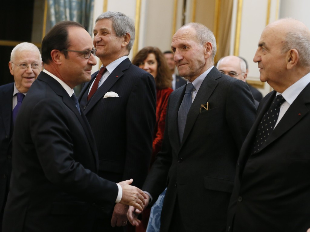 Guy Canivet, centre, pictured shaking hands with French President Francois Hollande ©Getty Images