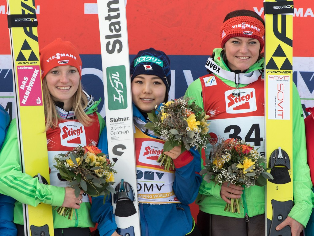 Sara Takanashi, centre, won today's FIS Ski Jumping World Cup event in Hinzenbach. Germans Katharina Althaus, left, and Carina Vogt were second and third ©Getty Images