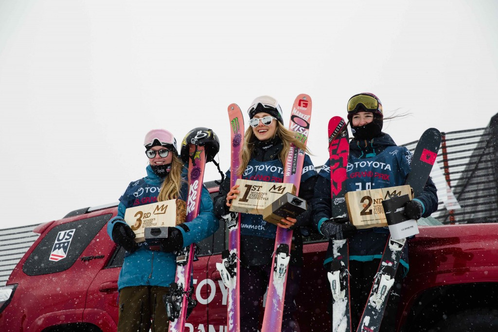 Maggie Voison, centre, won her first FIS Freestyle World Cup event on home snow today ©FIS