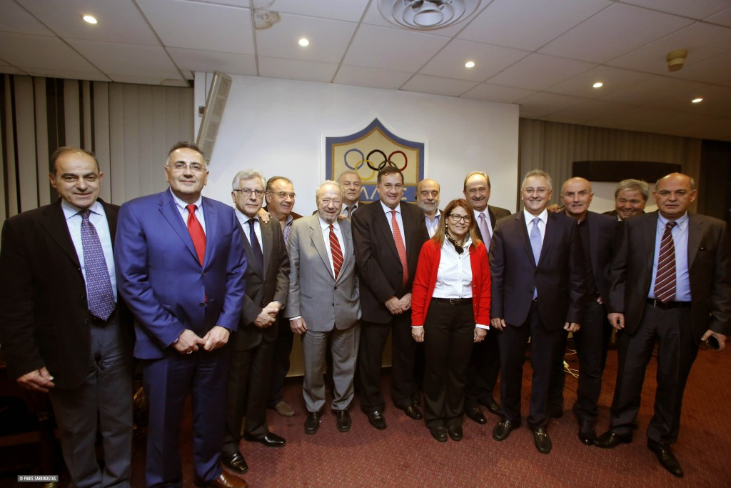 Spyros Capralos poses with Hellenic Olympic Committee colleagues ©HOC