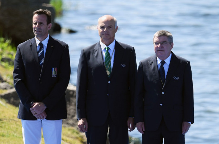 FISA President Jean-Christophe Rolland, pictured left at the Rio 2016 men's eight medal ceremony, has been in regular contact with the IOC President Thomas Bach, right, to discuss the best way forward for rowing within the Olympic Movement ©Getty Images