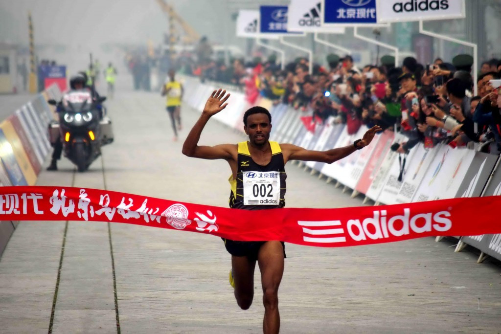 Girman Birahun pictured winning the Beijng International Marathon in 2014 ©Getty Images