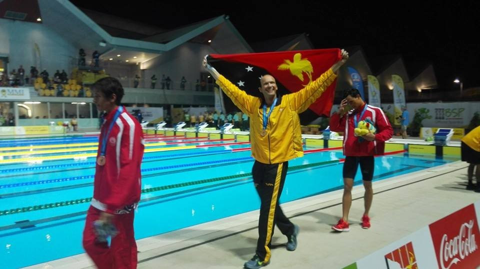 Papua New Guinea swimming star Ryan Pini won his third gold of Port Moresby 2015 in the men's 100 metres freestyle ©Justin Tkatchenko/Facebook