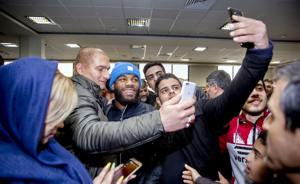 The American team, including Jordan Burroughs, have arrived in Iran ©UWW