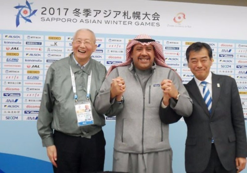 Olympic Council of Asia honorary life vice-president Wei Jizhong, left, and Sapporo 2017 director general Hiroshi Abe, right, alongside President Sheikh Ahmad Al-Fahad Al-Sabah ©OCA