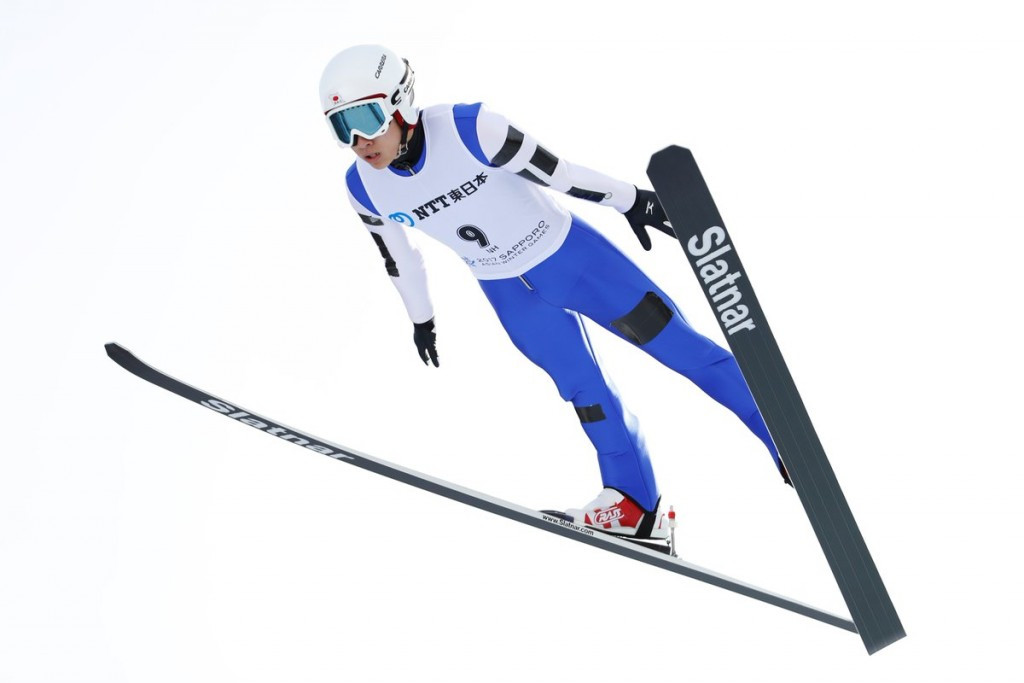 Yukiya Sata en route to normal hill ski jumping gold ©Getty Images