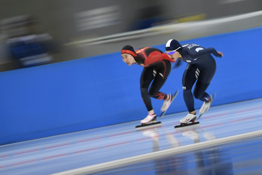 Kim Bo-Reum, right, powers towards the women's 5,000m speed skating gold medal ©Getty Images