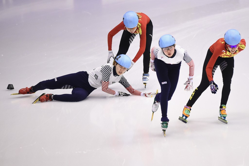 A South Korea skater takes a tumble as riders jostle for position in short track finals @Getty Images