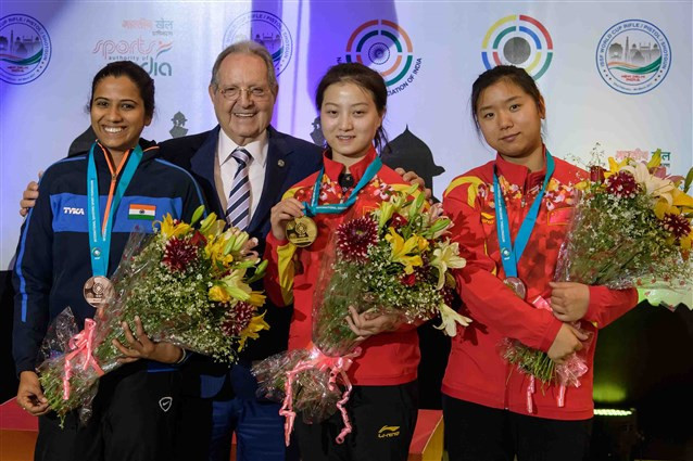 Shi Mengyao, centre, won the women's 10m air rifle contest ©ISSF