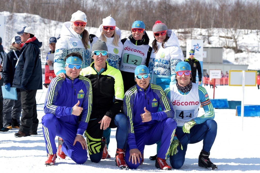 Kazakhstan's two teams celebrate after gold and silver medal winning performances in today's mixed relay ©Izturgan Aldauyev