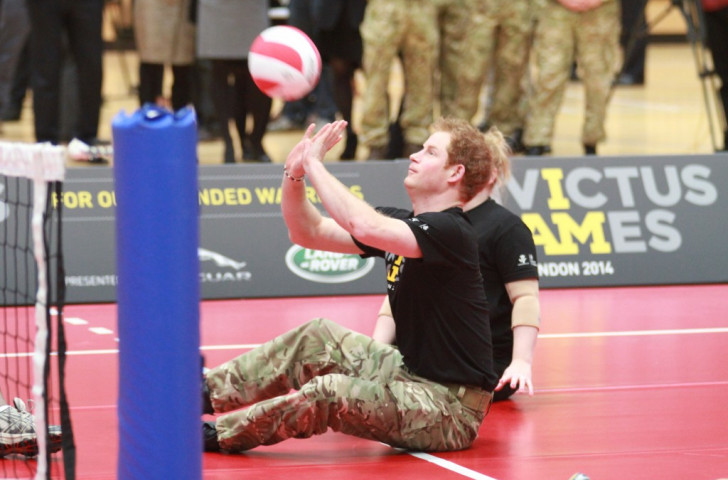 British Royal Prince Harry pictured being introduced to sitting volleyball ©Volleyball England